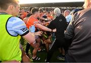10 May 2025; Players from both sides tussle after the Ulster GAA Football Senior Championship final match between Armagh and Donegal at St Tiernach's Park in Clones, Monaghan. Photo by David Fitzgerald/Sportsfile