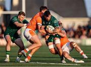 10 May 2025; Conor Oliver of Connacht is tackled by Edinburgh players Jack Brown, left, and Ali Price during the United Rugby Championship match between Connacht and Edinburgh at Dexcom Stadium in Galway. Photo by Thomas Flinkow/Sportsfile
