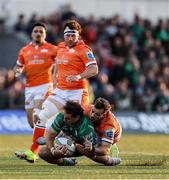 10 May 2025; Shayne Bolton of Connacht is tackled by Wes Goosen of Edinburgh during the United Rugby Championship match between Connacht and Edinburgh at Dexcom Stadium in Galway. Photo by Thomas Flinkow/Sportsfile