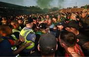 10 May 2025; Players from both teams tussle after the Ulster GAA Football Senior Championship final match between Armagh and Donegal at St Tiernach's Park in Clones, Monaghan. Photo by Ramsey Cardy/Sportsfile