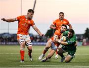 10 May 2025; Caolin Blade of Connacht is tackled by Charlie Shiel of Edinburgh during the United Rugby Championship match between Connacht and Edinburgh at Dexcom Stadium in Galway. Photo by Thomas Flinkow/Sportsfile