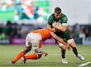 10 May 2025; Sean Jansen of Connacht is tackled by Sam Skinner of Edinburgh during the United Rugby Championship match between Connacht and Edinburgh at Dexcom Stadium in Galway. Photo by Thomas Flinkow/Sportsfile