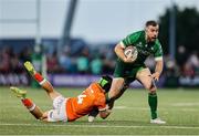 10 May 2025; JJ Hanrahan of Connacht is tackled by Darcy Graham of Edinburgh during the United Rugby Championship match between Connacht and Edinburgh at Dexcom Stadium in Galway. Photo by Thomas Flinkow/Sportsfile
