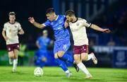 9 May 2025; Tommy Lonegan of Waterford in action against Colm Horgan of Galway United during the SSE Airtricity Men's Premier Division match between Waterford and Galway United at the Regional Sports Centre in Waterford. Photo by Matt Browne/Sportsfile