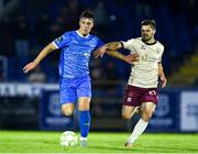 9 May 2025; Tommy Lonegan of Waterford in action against Colm Horgan of Galway United during the SSE Airtricity Men's Premier Division match between Waterford and Galway United at the Regional Sports Centre in Waterford. Photo by Matt Browne/Sportsfile