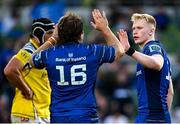 10 May 2025; Jamie Osborne of Leinster, right, celebrates with teammate John McKee after scoring their side's 12th try during the United Rugby Championship match between Leinster and Zebre Parma at the Aviva Stadium in Dublin. Photo by Seb Daly/Sportsfile
