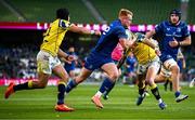 10 May 2025; Ciarán Frawley of Leinster in action against Zebre Parma players Simone Gesi, left, and Giacomo Da Re, on his way to scoring his side's 10th try during the United Rugby Championship match between Leinster and Zebre Parma at the Aviva Stadium in Dublin. Photo by Seb Daly/Sportsfile