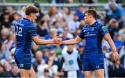 10 May 2025; Jordie Barrett of Leinster, left, is congratulated by teammate Garry Ringrose after scoring his side's fourth try during the United Rugby Championship match between Leinster and Zebre Parma at the Aviva Stadium in Dublin. Photo by Seb Daly/Sportsfile