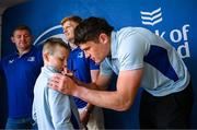 10 May 2025; Leinster players Tadhg Furlong, Tommy O'Brien and Alex Soroka with supporters in Autograph Alley before the United Rugby Championship match between Leinster and Zebre Parma at the Aviva Stadium in Dublin. Photo by Seb Daly/Sportsfile