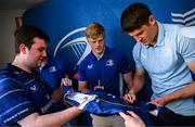 10 May 2025; Leinster players Tadhg Furlong, Tommy O'Brien and Alex Soroka with supporters in Autograph Alley before the United Rugby Championship match between Leinster and Zebre Parma at the Aviva Stadium in Dublin. Photo by Seb Daly/Sportsfile