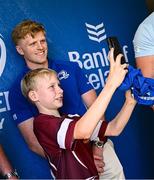10 May 2025; Leinster players Tadhg Furlong, Tommy O'Brien and Alex Soroka with supporters in Autograph Alley before the United Rugby Championship match between Leinster and Zebre Parma at the Aviva Stadium in Dublin. Photo by Seb Daly/Sportsfile