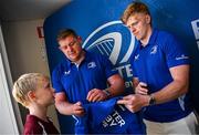 10 May 2025; Leinster players Tadhg Furlong, Tommy O'Brien and Alex Soroka with supporters in Autograph Alley before the United Rugby Championship match between Leinster and Zebre Parma at the Aviva Stadium in Dublin. Photo by Seb Daly/Sportsfile