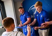 10 May 2025; Leinster players Tadhg Furlong, Tommy O'Brien and Alex Soroka with supporters in Autograph Alley before the United Rugby Championship match between Leinster and Zebre Parma at the Aviva Stadium in Dublin. Photo by Seb Daly/Sportsfile