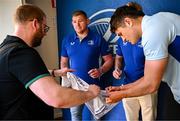 10 May 2025; Leinster players Tadhg Furlong, Tommy O'Brien and Alex Soroka with supporters in Autograph Alley before the United Rugby Championship match between Leinster and Zebre Parma at the Aviva Stadium in Dublin. Photo by Seb Daly/Sportsfile