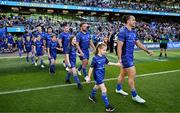 10 May 2025; Mascots walk out with Jack Boyle, Rónan Kelleher and James Lowe of Leinster before the United Rugby Championship match between Leinster and Zebre Parma at the Aviva Stadium in Dublin. Photo by Brendan Moran/Sportsfile