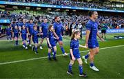 10 May 2025; Mascots walk out with Jack Boyle, Rónan Kelleher and James Lowe of Leinster before the United Rugby Championship match between Leinster and Zebre Parma at the Aviva Stadium in Dublin. Photo by Brendan Moran/Sportsfile