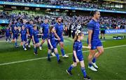 10 May 2025; Mascots walk out with Jamie Osborne, Thomas Clarkson, Jack Boyle, Rónan Kelleher and James Lowe of Leinster before the United Rugby Championship match between Leinster and Zebre Parma at the Aviva Stadium in Dublin. Photo by Brendan Moran/Sportsfile