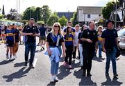 10 May 2025; Tipperary supporters supporters make their way to the Munster GAA Hurling Senior Championship Round 3 match between Clare and Tipperary at Zimmer Biomet Páirc Chíosóg in Ennis, Clare. Photo by Ray McManus/Sportsfile