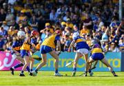 10 May 2025; Girls from schools in both Clare and Tipperary play a game of camogie during the Munster GAA Hurling Senior Championship Round 3 match between Clare and Tipperary at Zimmer Biomet Páirc Chíosóg in Ennis, Clare. Photo by Ray McManus/Sportsfile