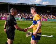 10 May 2025; Tony Kelly of Clare shakes hands with referee James Owens before the Munster GAA Hurling Senior Championship Round 3 match between Clare and Tipperary at Zimmer Biomet Páirc Chíosóg in Ennis, Clare. Photo by Ray McManus/Sportsfile