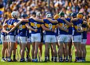 10 May 2025; The Tipperary players in a huddle before the Munster GAA Hurling Senior Championship Round 3 match between Clare and Tipperary at Zimmer Biomet Páirc Chíosóg in Ennis, Clare. Photo by Ray McManus/Sportsfile