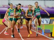 11 May 2025; Sharlene Mawdsley of Ireland, second from right, takes the baton from teammate Rachel McCann, far right, whilst competing in the women's 4x400m World Championship Qualifying Round 2 during day two of the 2025 World Athletics Relays at Guangdong Olympic Stadium in Guangzhou, China. Photo by Nikola Krstic/Sportsfile