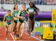 11 May 2025; Rachel McCann of Ireland, centre, and teammate Rhasidat Adeleke, right, competing in the women's 4x400m World Championship Qualifying Round 2 during day two of the 2025 World Athletics Relays at Guangdong Olympic Stadium in Guangzhou, China. Photo by Nikola Krstic/Sportsfile