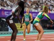 11 May 2025; Sophie Becker of Ireland, centre, prepares to pass the baton to teammate Rhasidat Adeleke whilst competing in the women's 4x400m World Championship Qualifying Round 2 during day two of the 2025 World Athletics Relays at Guangdong Olympic Stadium in Guangzhou, China. Photo by Nikola Krstic/Sportsfile