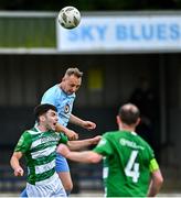11 May 2025; Eoin Rhodes of North End United heads on goal ahead of Brian Walsh of Castlebar Celtic during the Sports Direct Men’s FAI Cup first round match between North End United and Castlebar Celtic at Hollygrove Townparks in Wexford. Photo by Tyler Miller/Sportsfile
