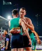 11 May 2025; Jack Raftery of Ireland, right, with teammate Cillín Greene after competing in the men's 4x400m World Championship Qualifying Round 2 during day two of the 2025 World Athletics Relays at Guangdong Olympic Stadium in Guangzhou, China. Photo by Nikola Krstic/Sportsfile