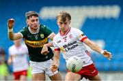 11 May 2025; Evan Boyle of Kerry in action against Fiachra Nelis of Tyrone during the Dalata Hotel Group GAA Football All-Ireland U20 Championship semi-final match between Kerry and Tyrone at Laois Hire O'Moore Park in Portlaoise, Laois. Photo by Thomas Flinkow/Sportsfile