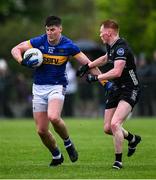 11 May 2025; Steven O'Brien of Tipperary in action against Evan Lyons of Sligo during the Táilteann Cup match between Sligo and Tipperary at Kilcoyne Memorial Park in Tubbercurry, Sligo. Photo by Ray McManus/Sportsfile