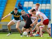 11 May 2025; Tomás Kennedy of Kerry in action against Tyrone goalkeeper Conan McGarvey during the Dalata Hotel Group GAA Football All-Ireland U20 Championship semi-final match between Kerry and Tyrone at Laois Hire O'Moore Park in Portlaoise, Laois. Photo by Thomas Flinkow/Sportsfile