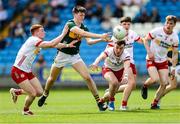 11 May 2025; Ben Murphy of Kerry in action against Tyrone players Callum Daly, left, and Seán Broderick during the Dalata Hotel Group GAA Football All-Ireland U20 Championship semi-final match between Kerry and Tyrone at Laois Hire O'Moore Park in Portlaoise, Laois. Photo by Thomas Flinkow/Sportsfile