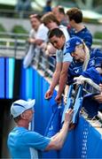 10 May 2025; Leinster head coach Leo Cullen signs autographs before the United Rugby Championship match between Leinster and Zebre Parma at the Aviva Stadium in Dublin. Photo by Brendan Moran/Sportsfile
