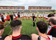 11 May 2025; Tyrone manager Paul Devlin speaks to his players after their side's victory in the Dalata Hotel Group GAA Football All-Ireland U20 Championship semi-final match between Kerry and Tyrone at Laois Hire O'Moore Park in Portlaoise, Laois. Photo by Thomas Flinkow/Sportsfile