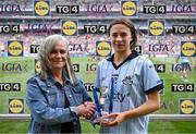 11 May 2025; Sophie McIntryre of Dublin receives the Player of the Match award from Michelle Wyse, Leinster LGFA Secretary, after the TG4 Leinster LGFA Senior Football Championship final match between Dublin and Meath at Croke Park in Dublin.