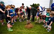 11 May 2025; IRFU Junior vice-president Tony O'Byrne, right, and Leinster rugby president Declan Gardiner turn the first sod alongside members of the Stillorgan Rathfarnham RFC underage players during the opening ceremony for the new Stillorgan Rathfarnham RFC Clubhouse at Stillorgan Rathfarnham RFC in Stillorgan, Dublin. Photo by Ben McShane/Sportsfile
