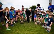 11 May 2025; IRFU Junior vice-president Tony O'Byrne, right, and Leinster rugby president Declan Gardiner turn the first sod alongside members of the Stillorgan Rathfarnham RFC underage players during the opening ceremony for the new Stillorgan Rathfarnham RFC Clubhouse at Stillorgan Rathfarnham RFC in Stillorgan, Dublin. Photo by Ben McShane/Sportsfile