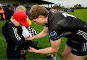 11 May 2025; Pat Spillane of Sligo signs a supporters jersey after the Táilteann Cup match between Sligo and Tipperary at Kilcoyne Memorial Park in Tubbercurry, Sligo. Photo by Ray McManus/Sportsfile