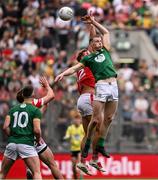 11 May 2025; Mathew Costello of Meath in action against Conor Grimes of Louth during the Leinster GAA Football Senior Championship final match between Louth and Meath at Croke Park in Dublin. Photo by Ramsey Cardy/Sportsfile