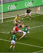 11 May 2025; Kieran McArdle of Louth is fouled by Donal Keogan, left, and Seán Coffey of Meath, leading to a penalty, during the Leinster GAA Football Senior Championship final match between Louth and Meath at Croke Park in Dublin. Photo by Ben McShane/Sportsfile