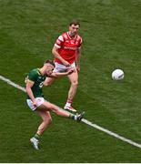 11 May 2025; Ruairí Kinsella of Meath kicks a point despite the attention of Sam Mulroy of Louth during the Leinster GAA Football Senior Championship final match between Louth and Meath at Croke Park in Dublin. Photo by Ben McShane/Sportsfile