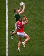 11 May 2025; Jack Flynn of Meath catches a high-ball ahead of Conor Grimes of Louth during the Leinster GAA Football Senior Championship final match between Louth and Meath at Croke Park in Dublin. Photo by Ben McShane/Sportsfile