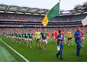 11 May 2025; Meath captain Eoghan Frayne and Louth captain Ciarán Downey lead their teams in the parade behind The Artane Band before the Leinster GAA Football Senior Championship final match between Louth and Meath at Croke Park in Dublin. Photo by Piaras Ó Mídheach/Sportsfile