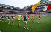 11 May 2025; Meath captain Eoghan Frayne and Louth captain Ciarán Downey lead their teams in the parade behind The Artane Band before the Leinster GAA Football Senior Championship final match between Louth and Meath at Croke Park in Dublin. Photo by Piaras Ó Mídheach/Sportsfile