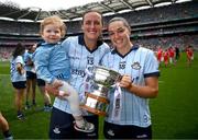 11 May 2025; Hannah Tyrrell, with her daughter Aoife, and Sinéad Goldrick of Dublin after the TG4 Leinster LGFA Senior Football Championship final match between Dublin and Meath at Croke Park in Dublin. Photo by Ramsey Cardy/Sportsfile