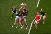 11 May 2025; Tommy Durnin of Louth contests a high-ball against Jack Flynn, left, and Bryan Menton of Meath during the Leinster GAA Football Senior Championship final match between Louth and Meath at Croke Park in Dublin. Photo by Ben McShane/Sportsfile