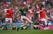 11 May 2025; Mathew Costello of Meath shoots to score his side's first goal, under pressure from Louth players Peter Lynch, left, and Donal McKenny during the Leinster GAA Football Senior Championship final match between Louth and Meath at Croke Park in Dublin. Photo by Piaras Ó Mídheach/Sportsfile