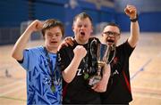 11 May 2025; Dundalk players, from left, David O'Hare, Jamie Linden and Micheál McCloy celebrate with the cup after winning the LOI Cairdeas Cup Festival final match between Dundalk and Finn Harps at the National Indoor Arena on the Sport Ireland Campus in Dublin. Photo by Stephen McCarthy/Sportsfile
